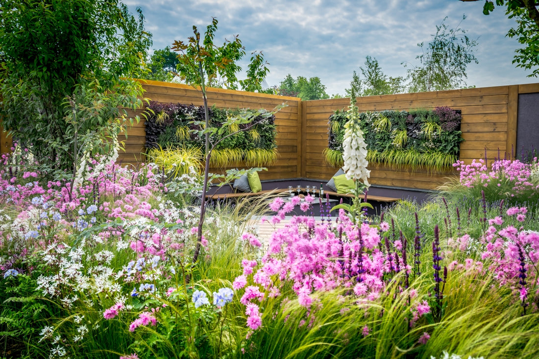 A lush garden with pink and white flowers