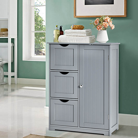 The floor cabinet placed in a bathroom with towels and a vase of flowers on the top surface