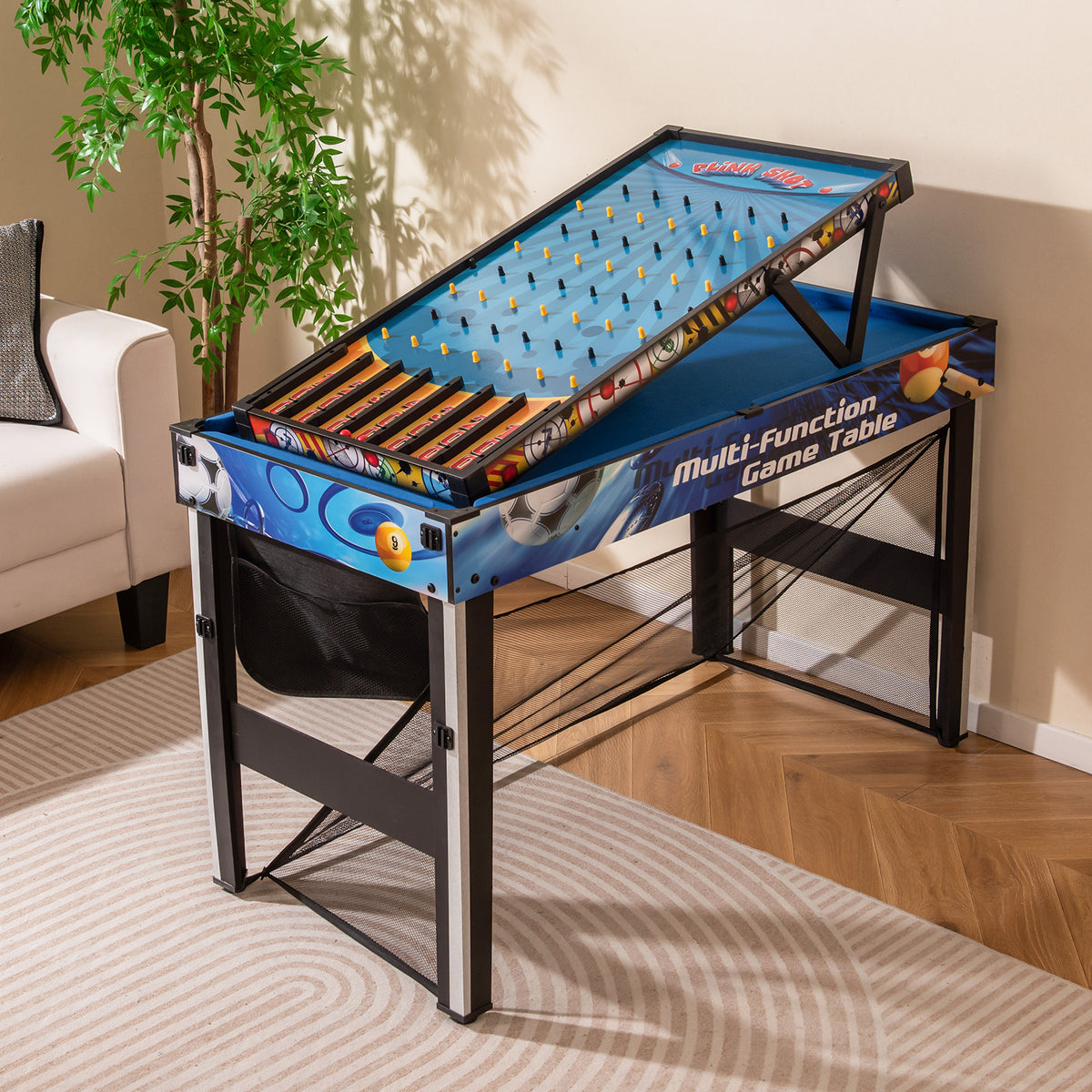 Close-up of the multi-game table set up for a marble game