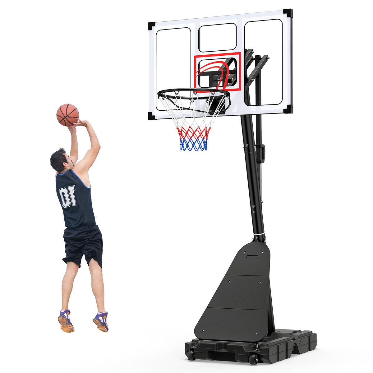 Man practicing basketball shots indoors with the portable hoop