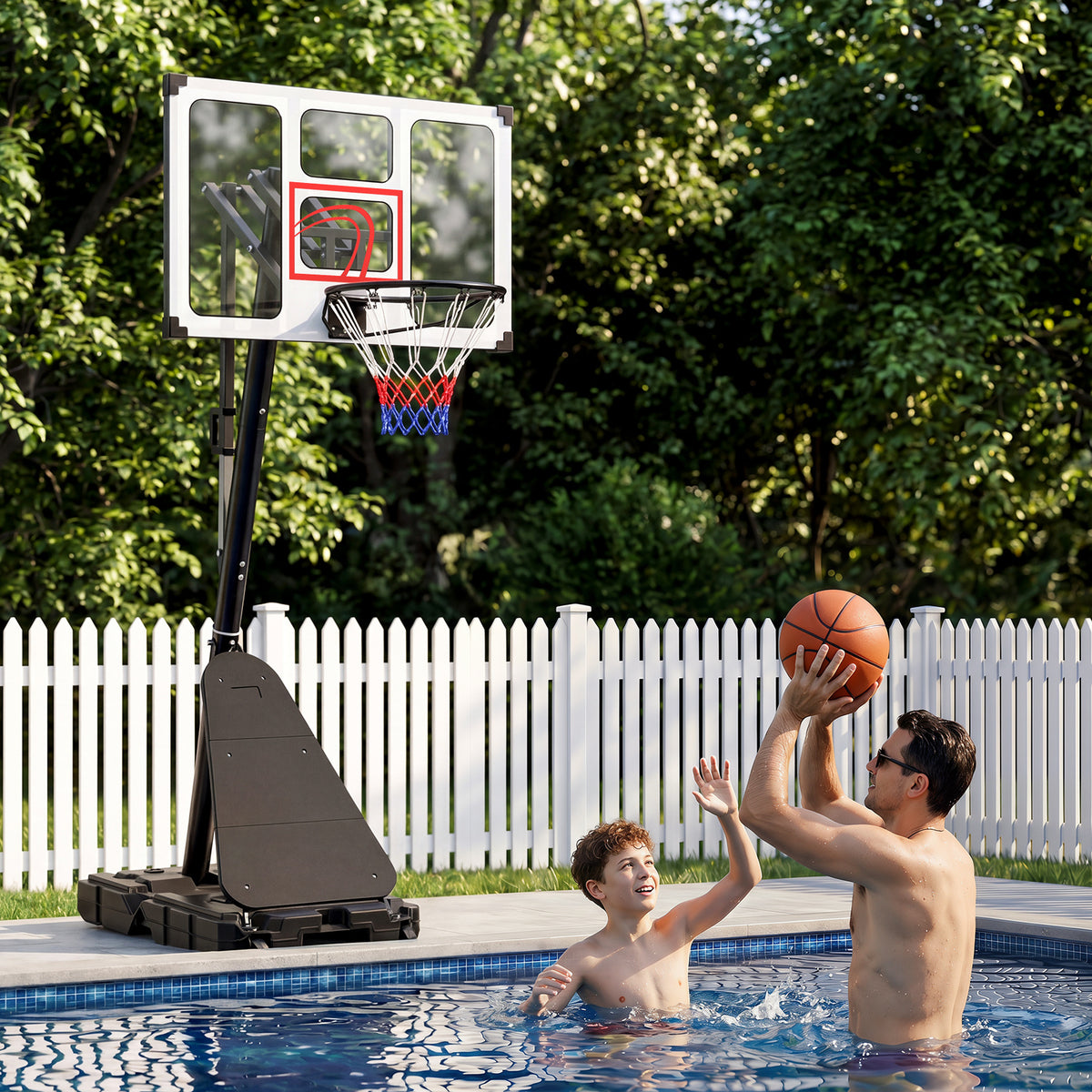 Father and son playing basketball in a swimming pool with the sport equipment