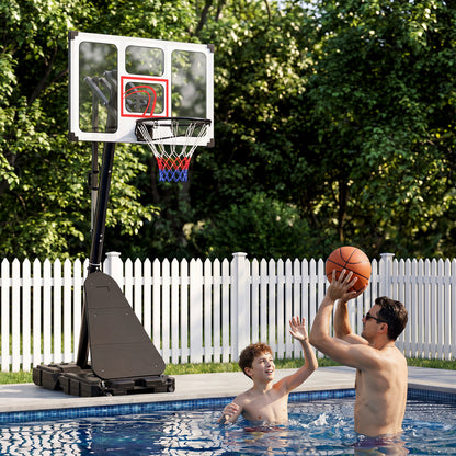 Father and son playing basketball in a swimming pool with the sport equipment