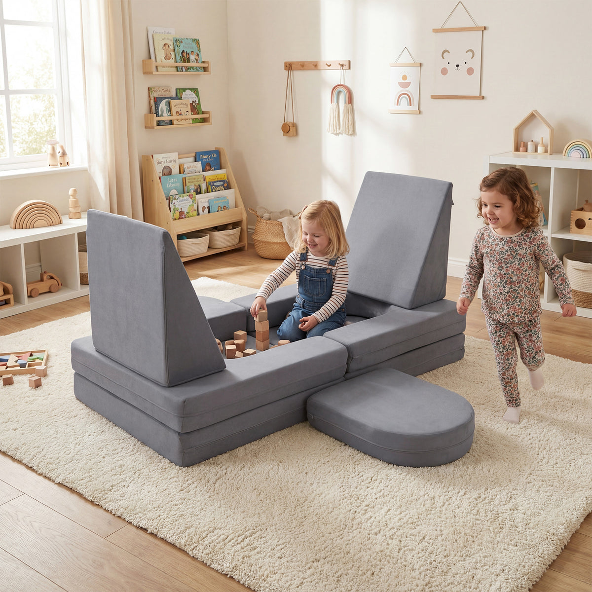 The soft play set configured as a small enclosed play area with two children inside