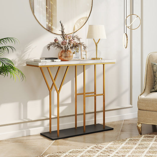 The console table placed against a wall in a hallway with a mirror and lamp on top