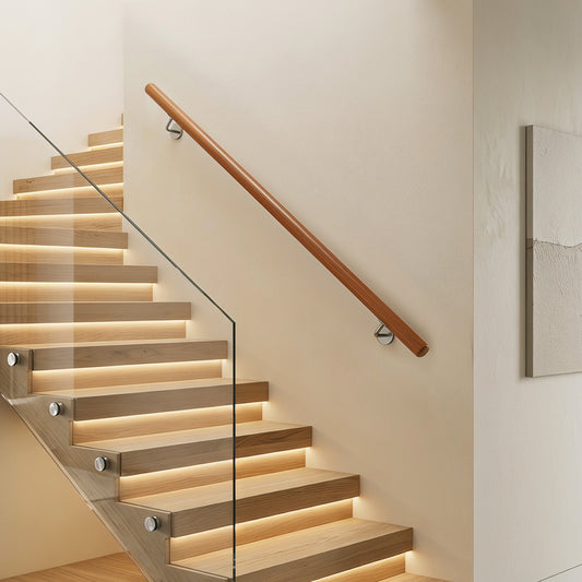 The indoor stair railing installed on a modern staircase with integrated lighting
