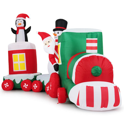 The Christmas inflatables train with Santa, snowman and penguin on a white background