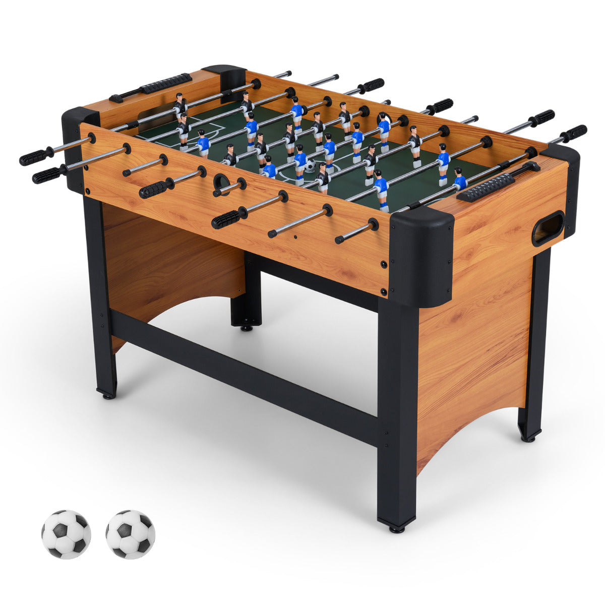 The soccer table shown from a high angle with two balls placed on the floor