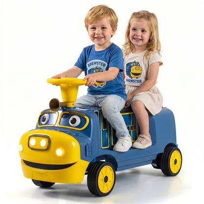 Two smiling children, a boy and a girl, sitting on the blue Chuggington ride on train
