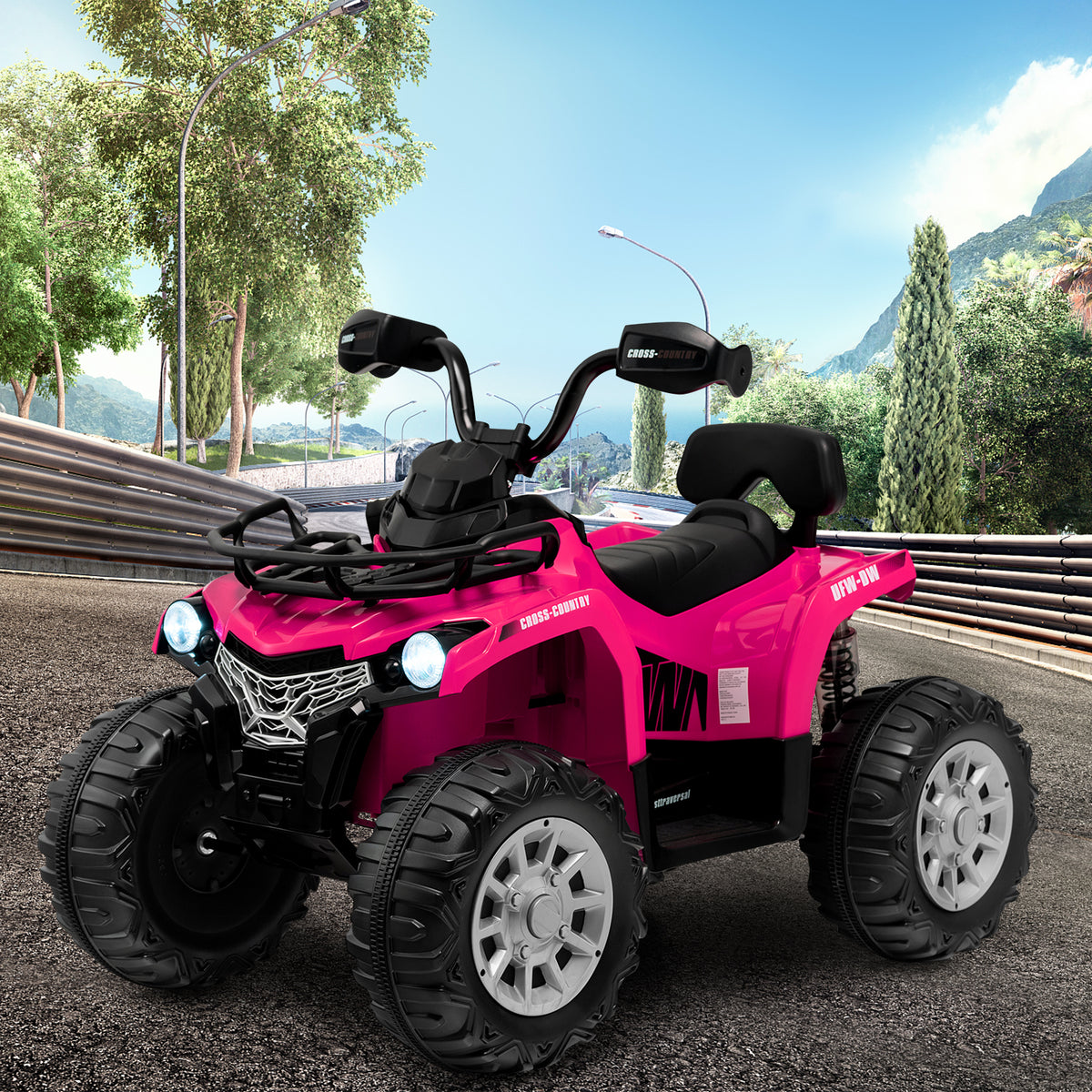 The kids electric car parked on a paved road with a scenic mountain landscape in the background