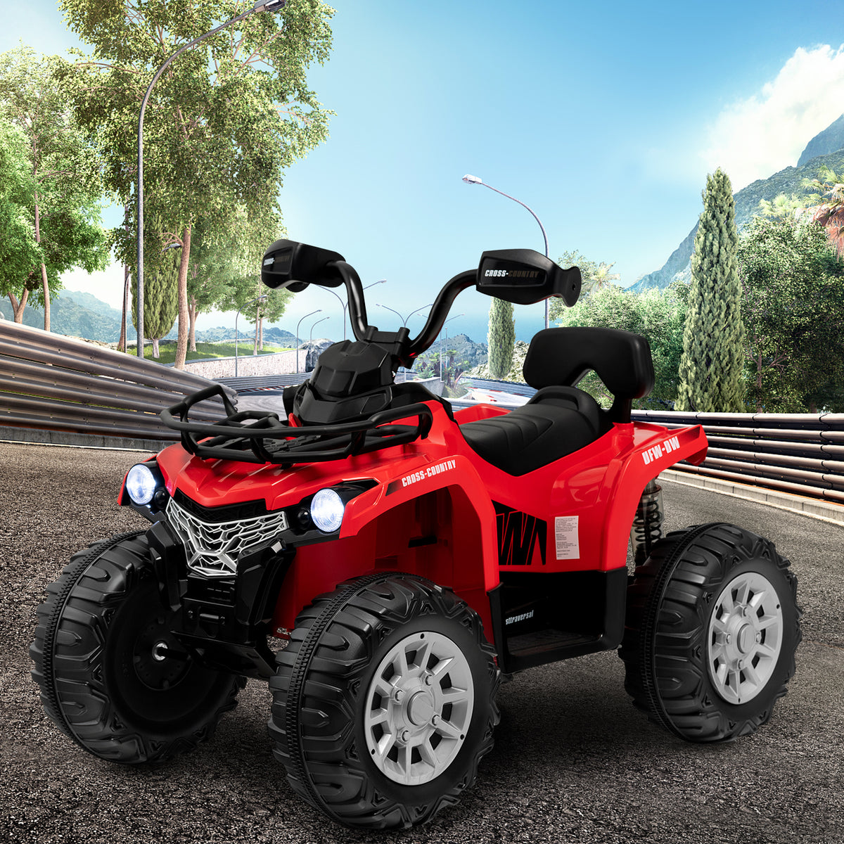 The kids electric car parked on a paved road with a scenic mountain landscape in the background