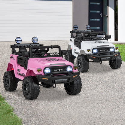 The kids electric car shown in both pink and white colour options on a driveway