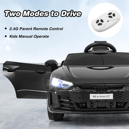 The black kids electric car with doors open, showing remote control and manual operation modes