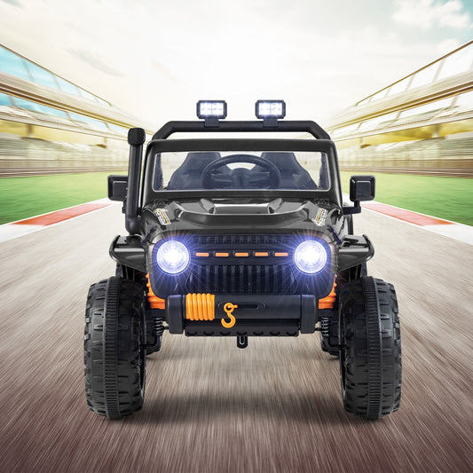 Black kids electric car with headlights on, front view on a race track