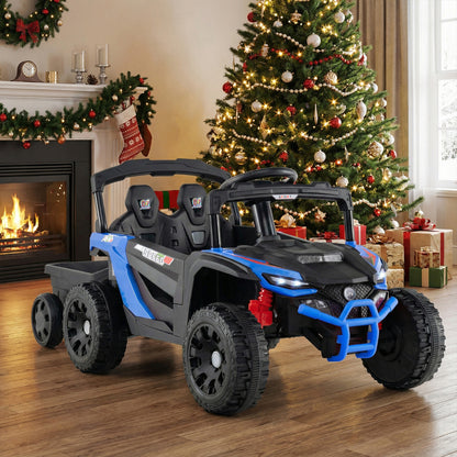 Kids electric tractor with trailer in a living room next to a Christmas tree