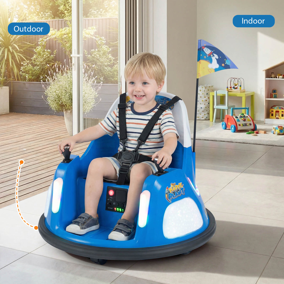A smiling boy sitting in a blue electric bumper car indoors, with a doorway and garden visible behind
