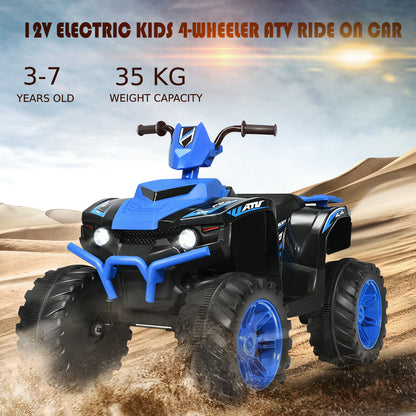 The kids electric quad bike parked on a sandy desert landscape under a bright sunny sky