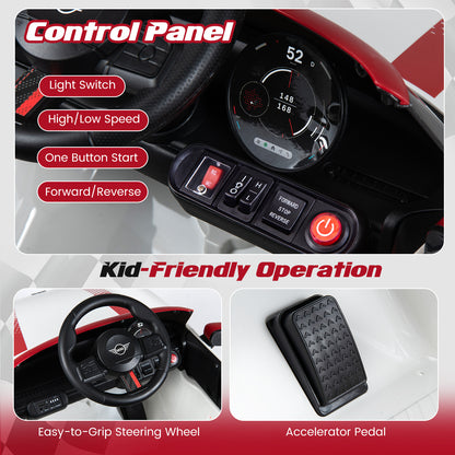 Close up of the control panel, steering wheel and accelerator pedal of the kids electric car