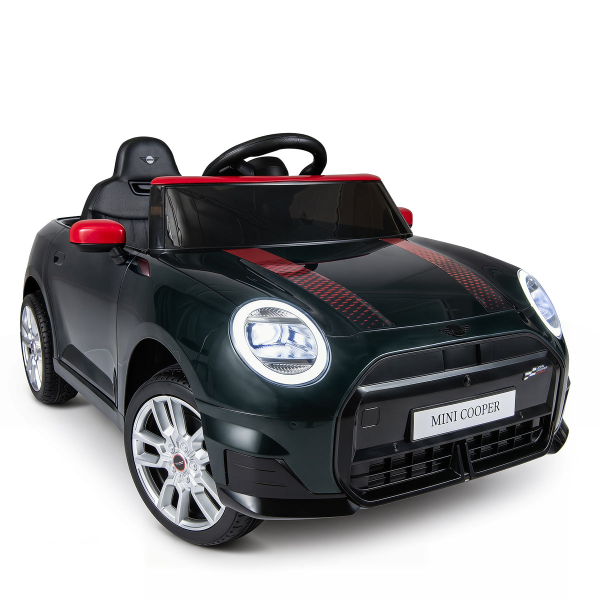 The black kids electric car is parked on a paved surface with a red trim detail