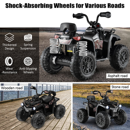 Kids electric quad vehicle with spring suspension and large wheels on different surfaces
