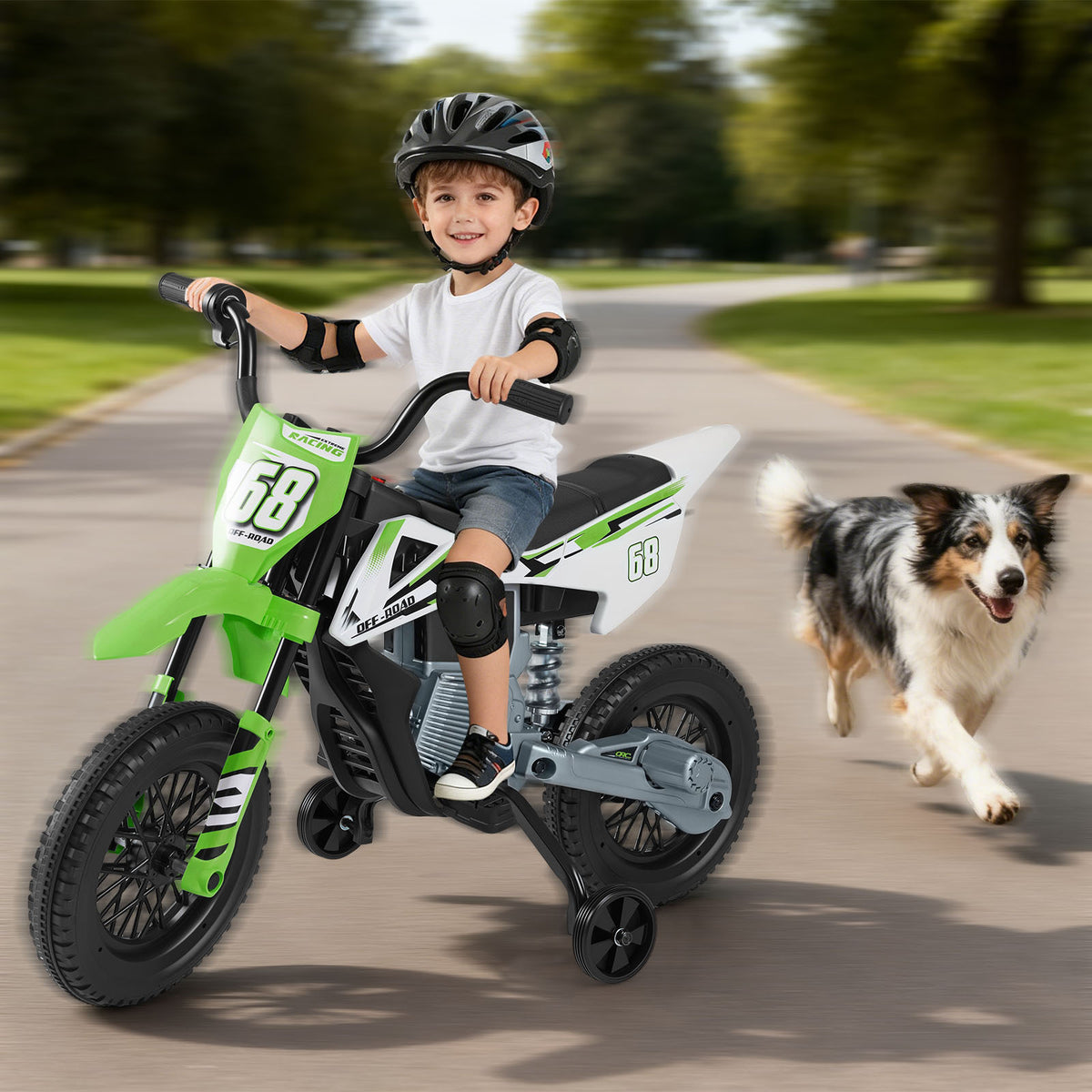The kids electric motorbike being ridden by a boy on a path with a dog running alongside