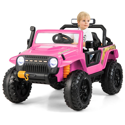 The kids electric car with a young child sitting in the driver seat