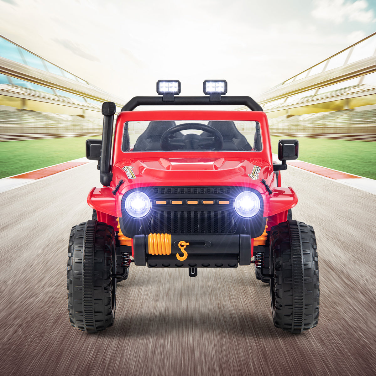 The red kids electric car seen from the front with lights on