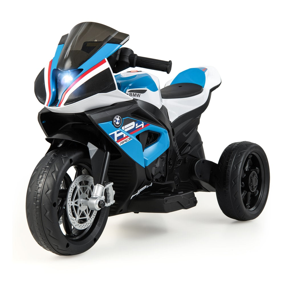 The kids electric motorbike shown from a front angle with the headlight illuminated