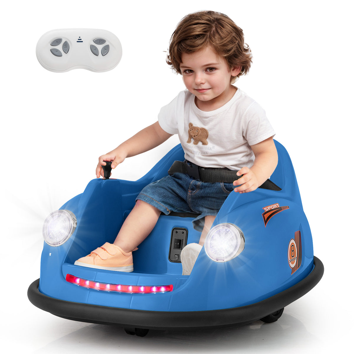 A young boy driving the navy blue ride on car with a remote control