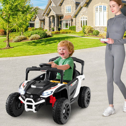 A woman stands next to a white kids electric UTV with a child sitting inside, on a paved driveway