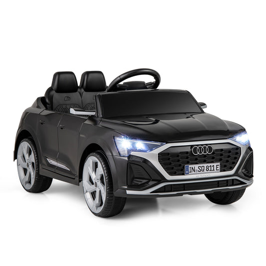 12V Kids Ride On Car in black, a front three-quarter view with the headlights on