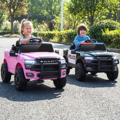 Two children ride in a pink and a black kids electric car