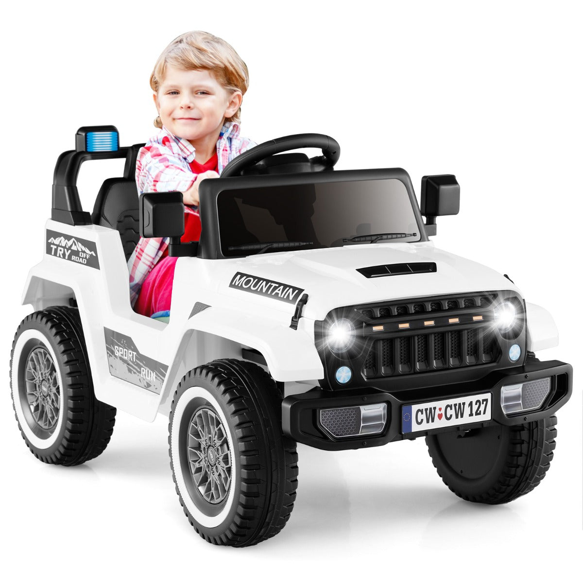 A young boy happily driving the white kids electric car with soft start and battery powered