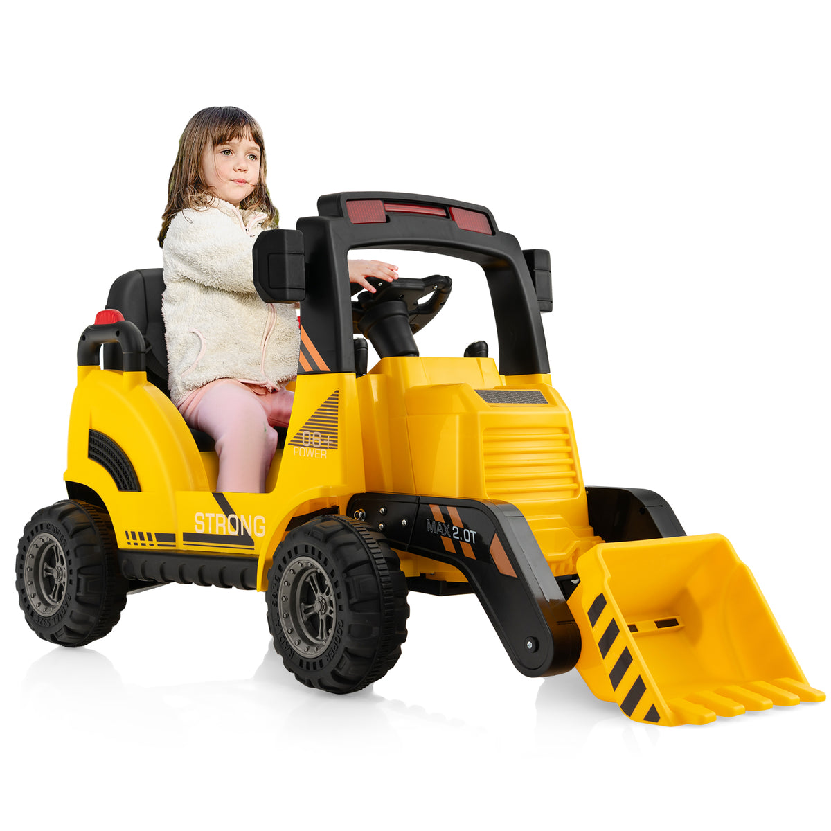 Young girl sitting in the yellow kids electric tractor