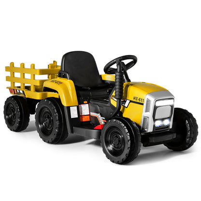 The yellow kids electric tractor with trailer is shown from the rear, highlighting its design