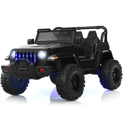 The black kids electric ride on truck from the front, showing its rugged design and bright headlights