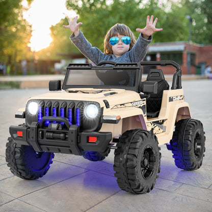 The khaki kids electric car with a child sitting inside on a paved outdoor area