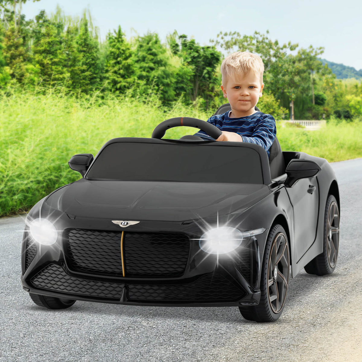 The black Bentley Bacalar kids electric car with a child in the driver seat