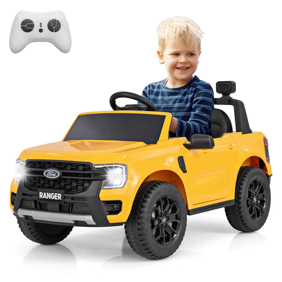 A happy child sits in the yellow kids electric car, holding the steering wheel