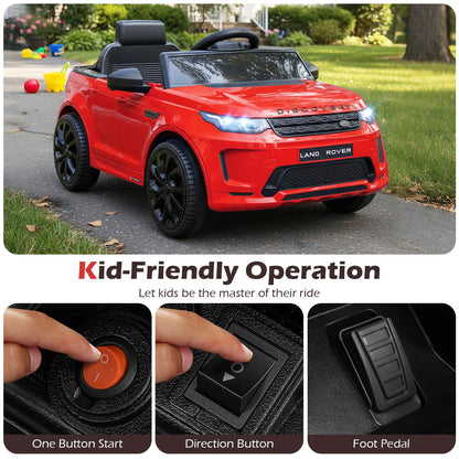 Close up of the red electric ride on car controls: start button, direction switch and foot pedal