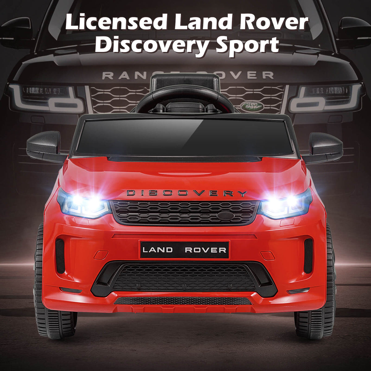 The red licensed Land Rover Discovery Sport electric car front view with headlights on