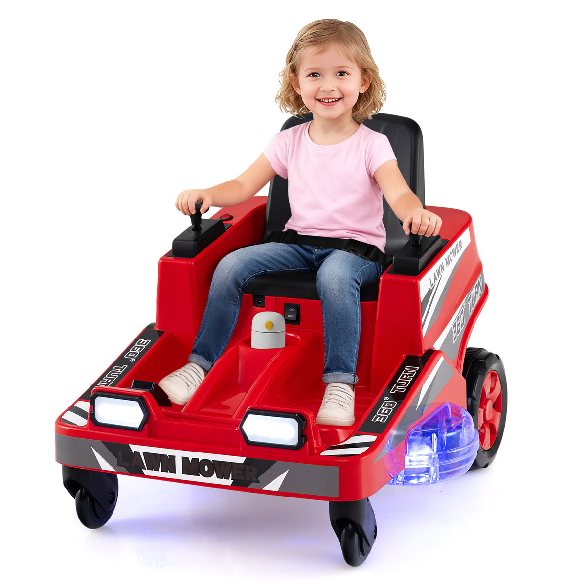 A young girl sits in the red ride on lawn mower for kids on a green lawn