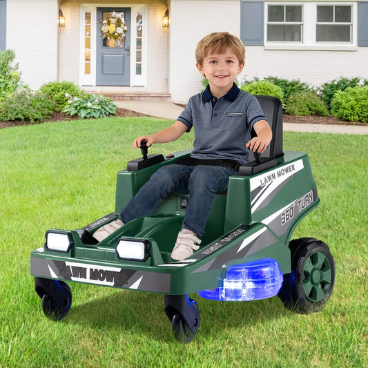 The kids electric car being driven by a young boy on a green lawn in front of a house