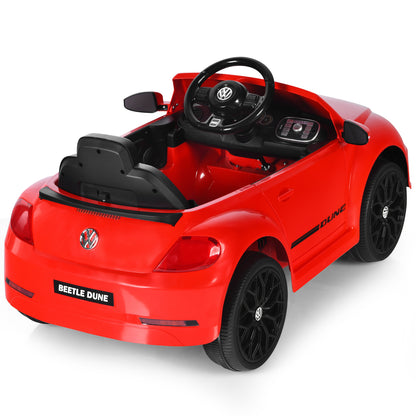 Rear view of the red kids electric ride on car showing the boot and wheels