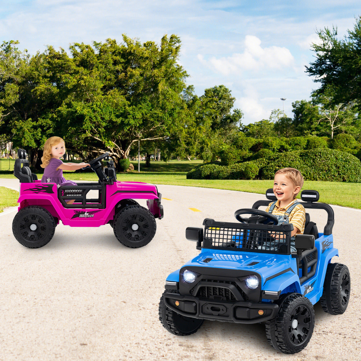 Two kids electric truck cars, one pink and one blue, on a paved path with children driving