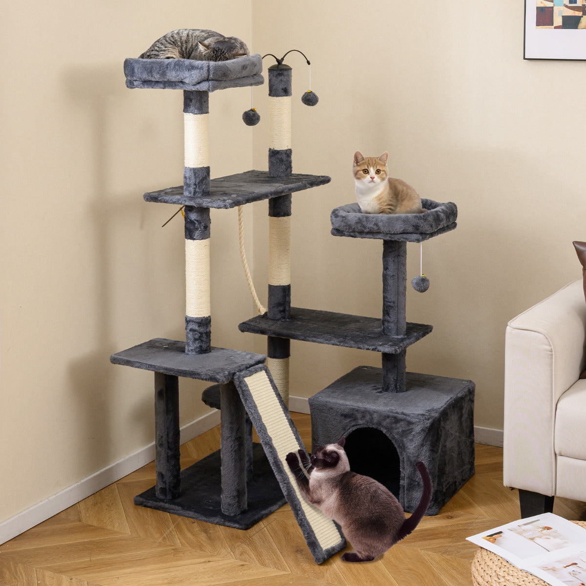 The cat tree placed in a living room corner with cats resting on the different levels