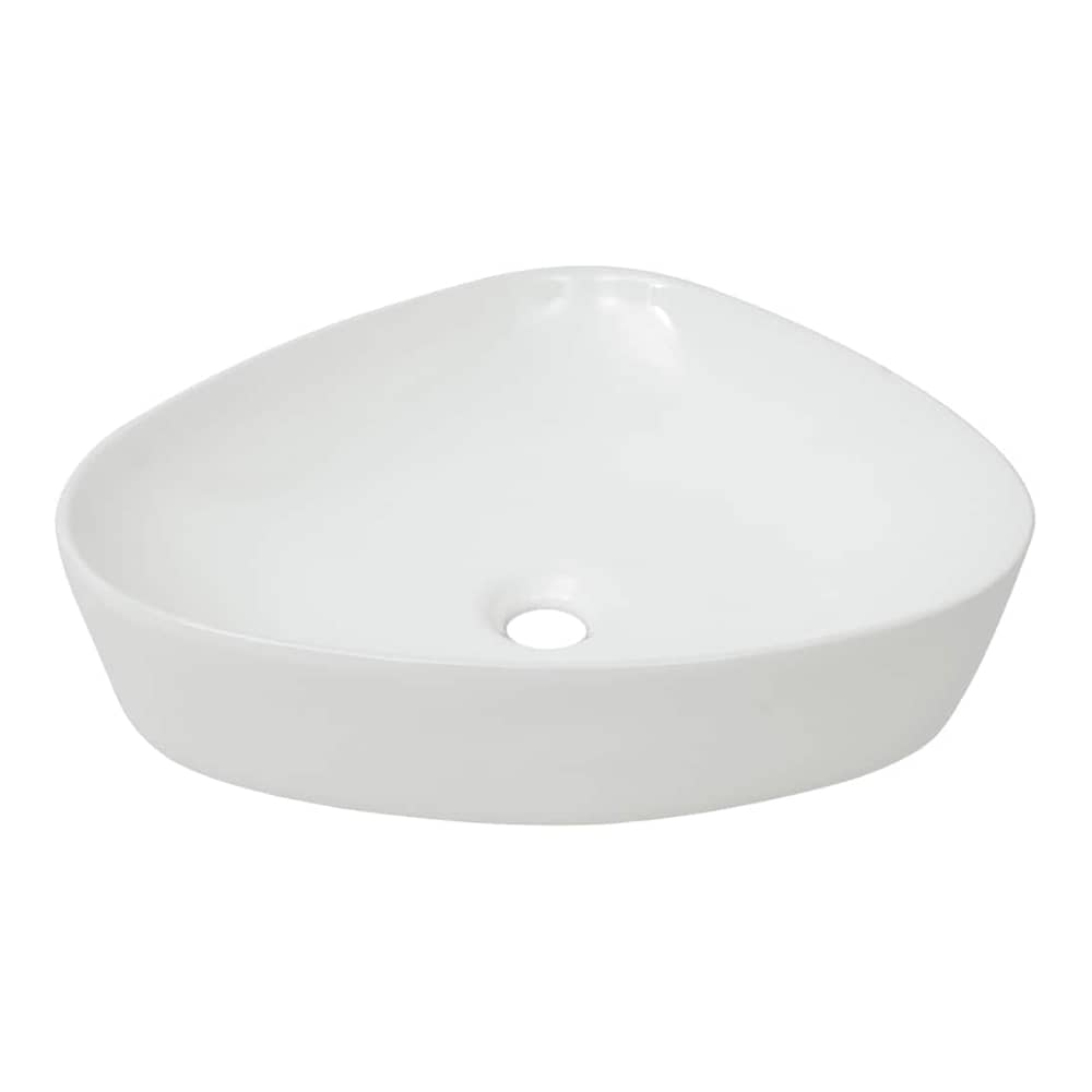 A white ceramic triangular basin with a central drain hole