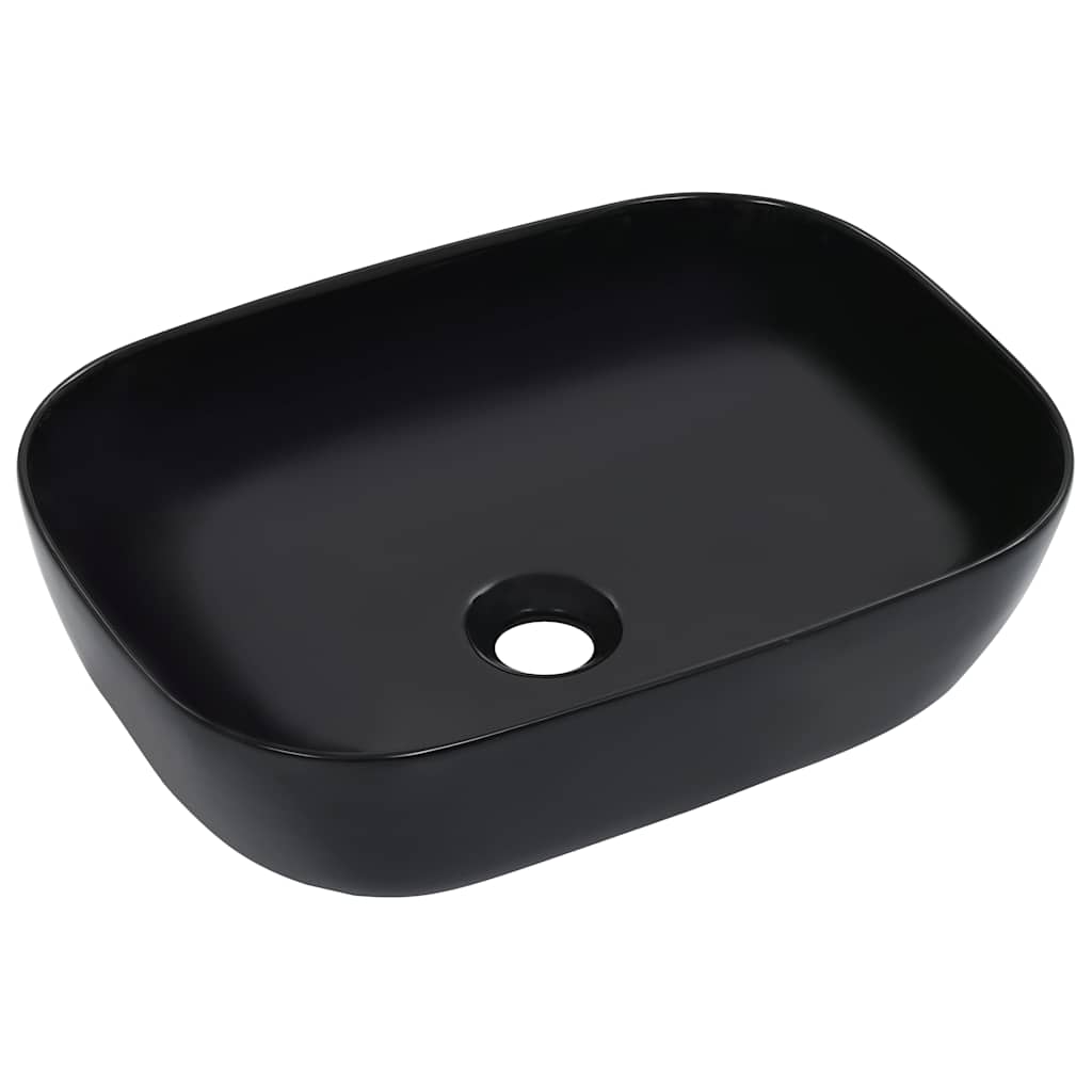 Wash Basin Black, a rectangular ceramic basin with rounded corners and a central drain hole