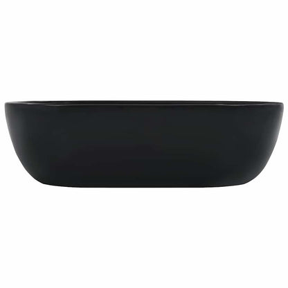 the black ceramic basin, showing its side profile and depth