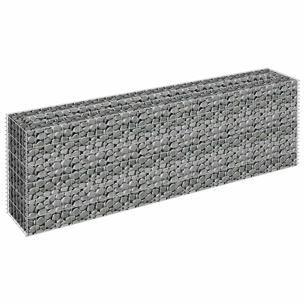A galvanised raised garden bed filled with stones