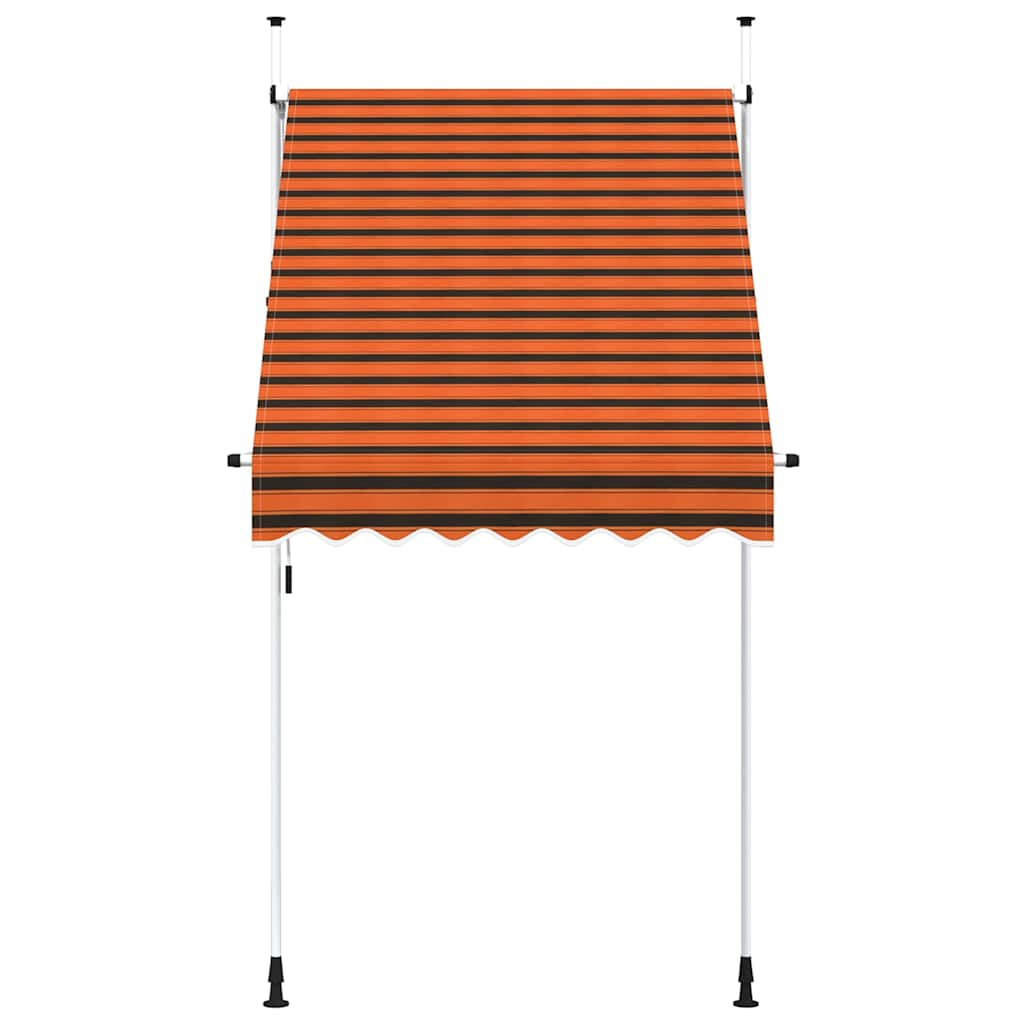 Orange and brown striped manual retractable awning fully retracted on a white frame